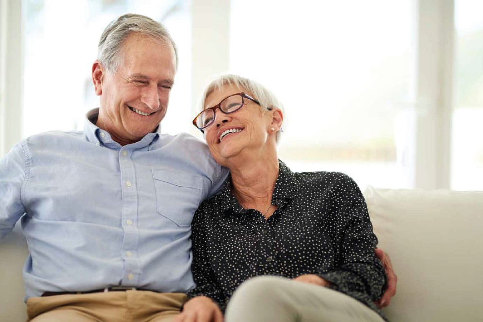 Cheerful senior couple residing in Chicago senior living communities