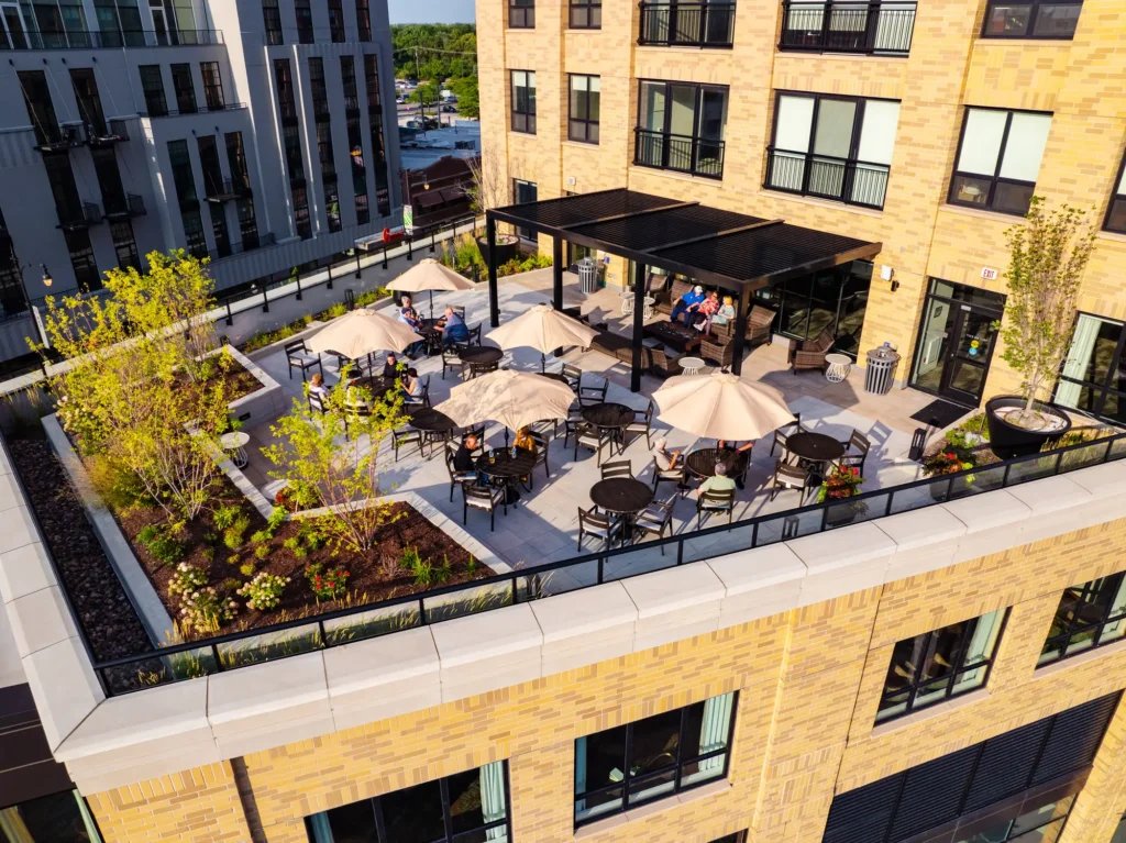 seniors sitting on rooftop area at Clarendale Six Corners in Chicago, Illinois.